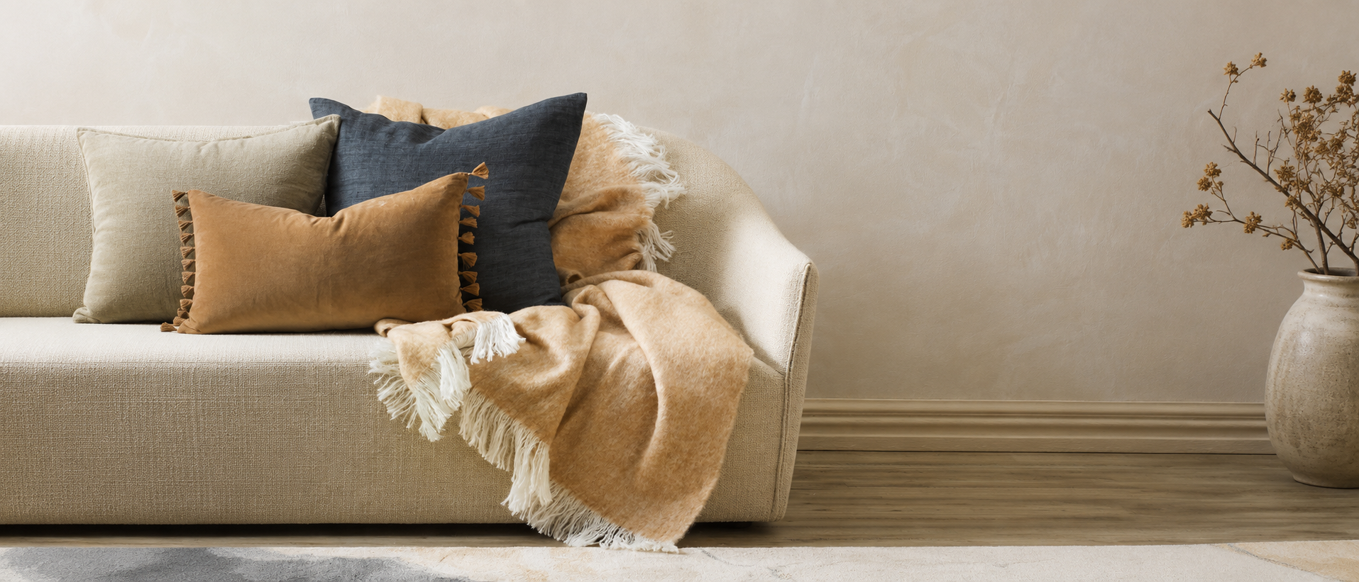Soft table linens styled in a relaxed home setting